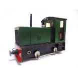 [32MM NARROW GAUGE]. A TURNER LOCO WORKS 0-4-0 DIESEL LOCOMOTIVE green livery, with an electric
