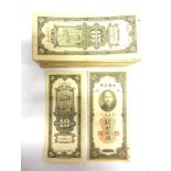 BANKNOTES - CHINA Approximately 305 Central Bank of China Ten Customs Gold Units notes, circa