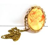 A VINTAGE 9CT GOLD CAMEO PENDANT/BROOCH And a marked 375 rope twist chain, the Cameo mounted in
