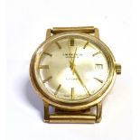 A GENLEMANS 9CT GOLD J.W BENSON AUTOMATIC WRISTWATCH The signed champagne dial fitted with gilt