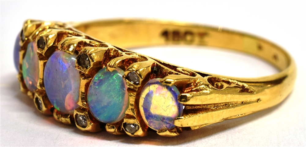 A STAMPED 18CT OPAL FIVE STONE BOAT RING The five oval graduated opals measuring approx 4mm - 5mm in - Image 4 of 5