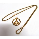 A 9ct GOLD MASONIC PENDANT PIECE WITH YELLOW METAL CHAIN the Hammer and Compass pendant piece of