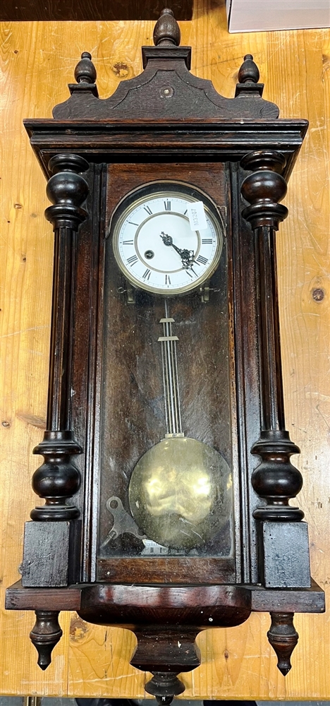 A CONTINENTAL 8-DAY WALL CLOCK with 6' enamel dial