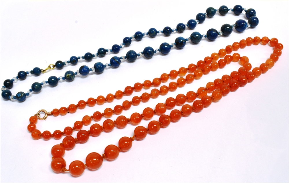 TWO VINTAGE NECKLACES A 9ct gold clasp graduated orange glass bead necklace, knotted with the