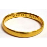 A 22CT GOLD BAND RING the band with Birmingham hallmark, worn date letter, size N ½ approx, weight