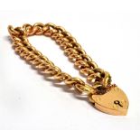 A 15CT ROSE GOLD HEART PADLOCK CURB LINK BRACELET Bracelet with safety chain, bracelet width 1cm,