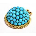 A TURQUOISE BOULE PENDANT PIECE The pendant in unmarked yellow metal with the raised boule set