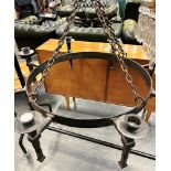 A LARGE AND HEAVY WROUGH IRON 8 LIGHT CANDELABRA approx 69cm diameter Condition Report : very heavy,
