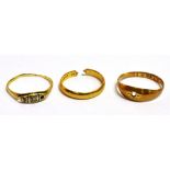 THREE RINGS a 22ct gold band ring with split shank, weight 2.5g, a 375 dress ring A/F, weight 1.