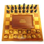 A JAQUES STAUNTON PATTERN CHESS SET the boxwood and ebony pieces with weighted bases, the kings 9.