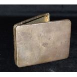 A SILVER CIGARETTE CASE The case of engine turned pattern, Birmingham hallmark, length 10.8cm, width