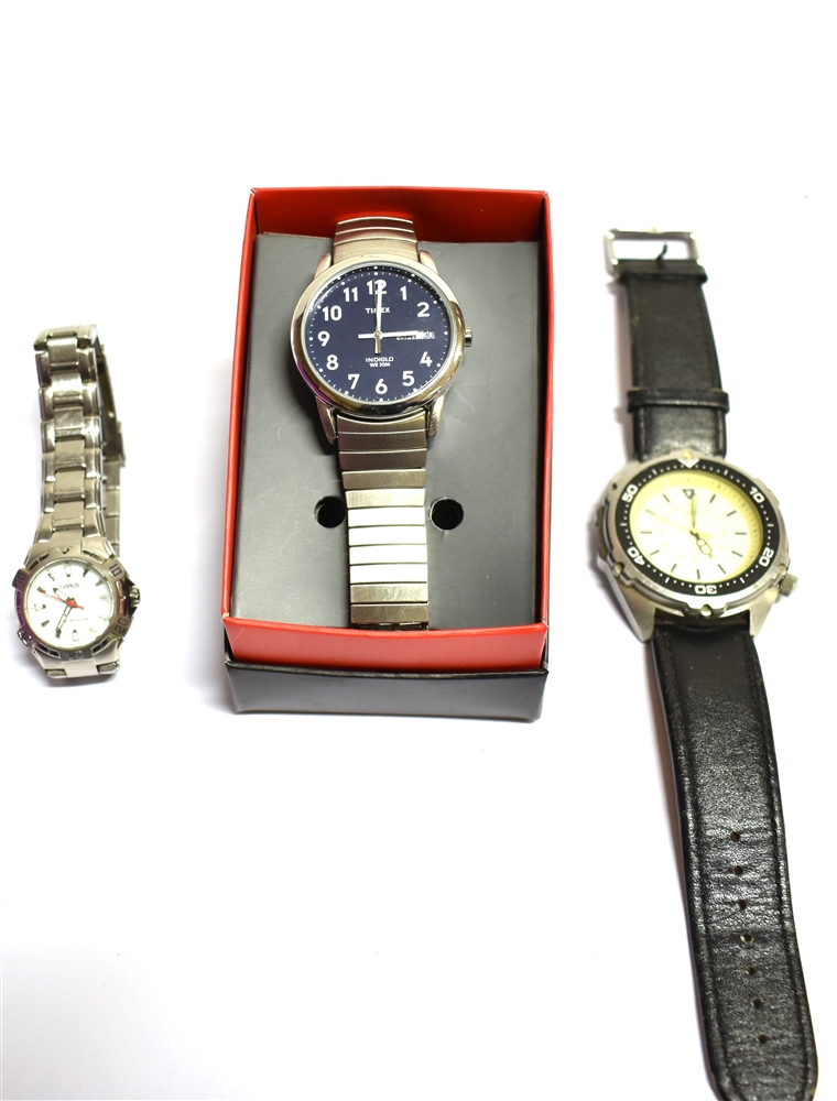 THREE WATCHES A boxed Timex INDIGLO WR 30M, day, date wristwatch in working condition, time