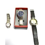 THREE WATCHES A boxed Timex INDIGLO WR 30M, day, date wristwatch in working condition, time