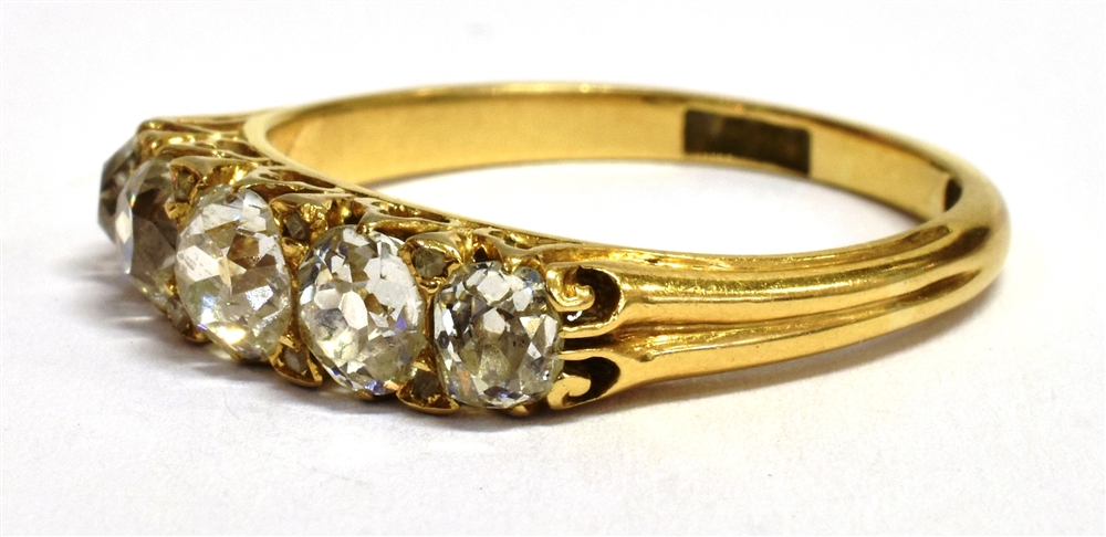 A STAMPED 18CT EUROPEAN CUT DIAMOND FIVE STONE BOAT RING The five graduated diamonds measuring 3-4mm - Image 3 of 3