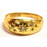 AN 18CT GOLD OLD CUT DIAMOND STAR SET RING the shank with worn marking, testing indicating 18ct,