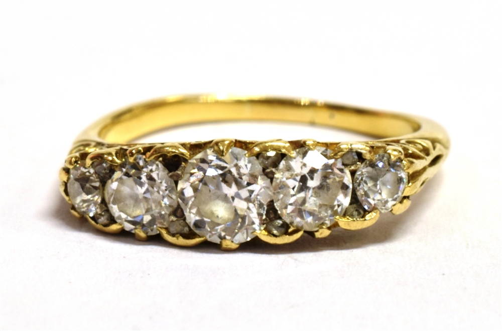 AN OLD CUT DIAMOND FIVE STONE BOAT RING The five graduated diamonds measuring approx 2,5mm -- 3,5mm