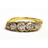 AN OLD CUT DIAMOND FIVE STONE BOAT RING The five graduated diamonds measuring approx 2,5mm -- 3,5mm