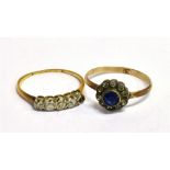 TWO VINTAGE RINGS A marked 9c blue and clear paste flower head ring, size O, weight 1.9g, A