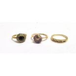 THREE STONE SET DRESS RINGS A marked 18ct Plat black quartz cluster ring, size K ½, weight 3g, a