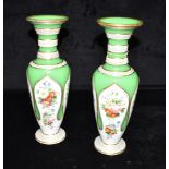 A PAIR OF FLASH CUT OPAQUE GLASS VASES with painted floral decoration, 30cm high Condition