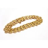 A STAMPED 15 YELLOW METAL TRIPLE ROW MARINER LINK BRACELET The bracelet fitted with a push clasp and