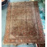 A RED GROUND RUG with triple pole medallion, 175cm x 235cm Condition Report : very badly faded and