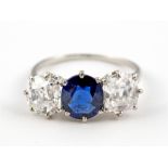 AN OLD CUT DIAMOND AND SAPPHIRE THREE STONE RING 3.3 carats in total, independent assessment present