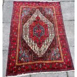 A NORTH WEST PERSIAN SENNEH RUG 165cm x 115cm Condition Report : good condition Condition reports