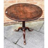 A MAHOGANY TILT TOP TRIPOD OCCASIONAL TABLE with birdcage action, the circular top 68cm diameter