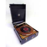 AN ANTORIA PORTABLE GRAMOPHONE with a blue rexine covered case. Condition Report : Motor working;