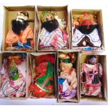 SEVEN CHINESE PUPPETS with painted composition heads, including a lion, each boxed. Condition Report