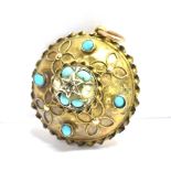 A STAMPED 15C TURQUOISE AND DIAMOND SET PENDANT PIECE The raised circular pendant centrally set with