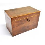 A VICTORIAN BURRWOOD TWIN COMPARTMENT TEA CADDY with boxwood stringing, 19cm wide 11cm deep 12.5cm