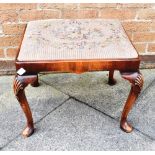 A MAHOGANY FRAMED STOOL with drop-in needlework seat, on cabriole supports, 49cm x 56cm Condition