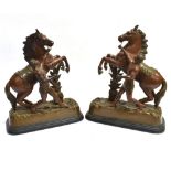 A PAIR OF PATINATED SPELTER MARLEY HORSES 41cm high