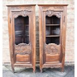 A PAIR OF FRENCH CARVED CHESTNUT CORNER CABINETS 70cm wide 171cm high Condition Report : some