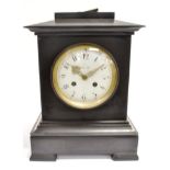 A VICTORIAN SLATE CASED MANTLE CLOCK the French 8 day movement striking on a coiled gong, the