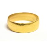 A 22CT GOLD BAND RING band width 5mm, hallmarked for Birmingham, date letter K, maker SH, ring