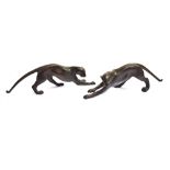 A PAIR OF BRONZE FIGURES OF JAGUARS 37cm long Condition Report : good condition Condition reports