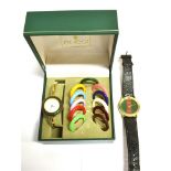 A BOXED GUCCI WATCH TOGETHER WITH A SEPARATE GUCCI WATCH The boxed Gucci watch with
