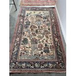 A CREAM GROUND KASHAN PICTORIAL RUG 223cm x 134cm Condition Report : good condition Condition