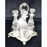 A GEORGE III SILVER CONDIMENT STAND The stand on four feet, ribbed pattern border and shell and