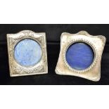 TWO SILVER FRONTED PICTURE FRAMES One frame decorated with ribboned bows and floral pattern,