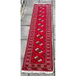 A NORTH EAST PERSIAN TURKOMAN RUNNER 295cm x 70cm Condition Report : good condition Condition