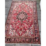A NORTH WEST PERSIAN LILLIHAN RUG 265cm x 155cm Condition Report : good condition Condition