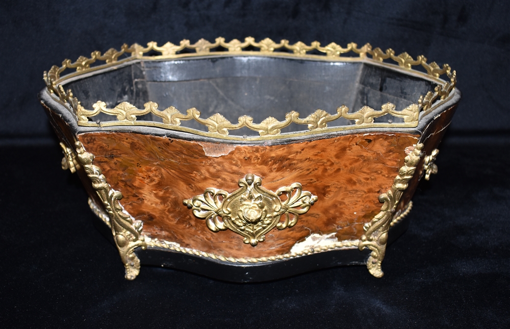 A FRENCH GILT METAL MOUNTED KINGWOOD CACHE POT of serpentine form, 36cm wide Condition Report :