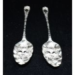 A MATCHED PAIR OF GEORGE III SILVER BERRY SPOONS Hallmarked for London (Leopards Head Crowned) 1802,