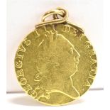 A GEORGE III GOLD GUINEA PENDANT PIECE The 1790 gold guinea with an unmarked rose metal scroll top