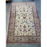A CREAM GROUND RUG 134cm x 210cm Condition Report : some historic moth damage Condition reports