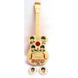 THE BEATLES - A SELCOL NEW SOUND GUITAR with printed portraits and facsimile signatures, fair